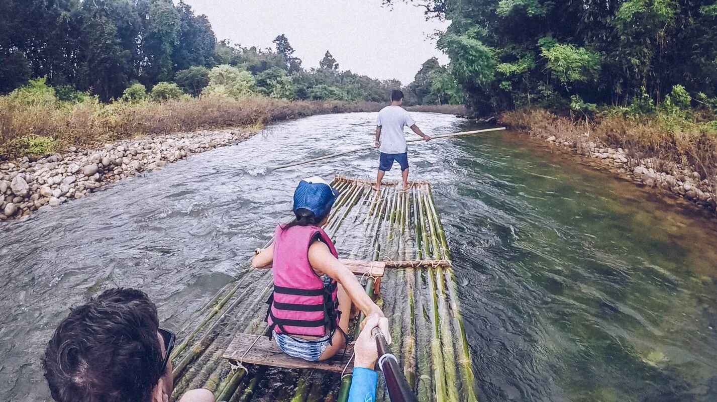 Glide through Vietnam’s lush rivers on a bamboo raft adventure